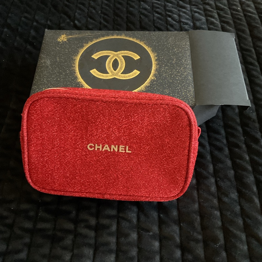Chanel beauty red glitter makeup bag. This can be converted to a crossbody.
